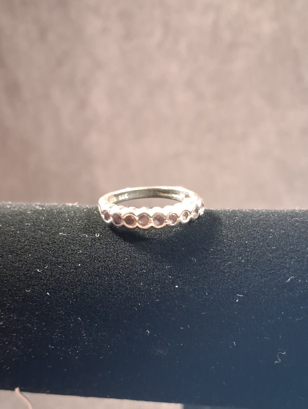 Marked Thailand 925 Sterling Silver with 9 Tiny Amethyst Stones 4mm Ring VG 7